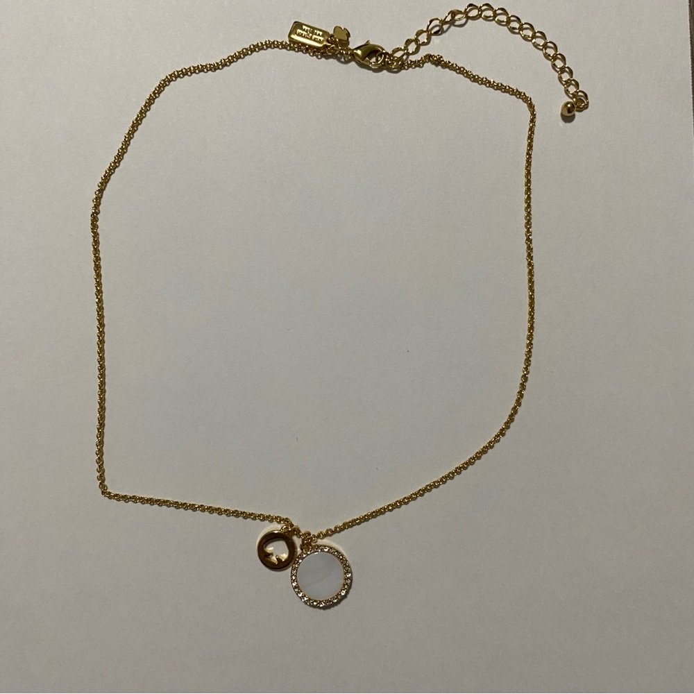 Kate Spade Elegant White Pendant on Gold Chain